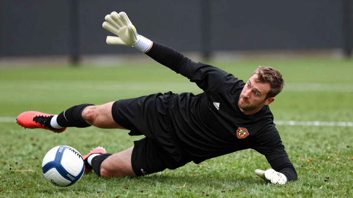 Crusaders Secure Premiership Status in Dramatic Penalty Shootout